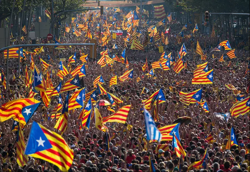BARCELONA, SPAIN - SEPTEMBER 11: Demonstrators march during a Pro-Independence demonstration as part of the celebrations of the National Day of Catalonia on September 11, 2014 in Barcelona, Spain. Thousands of Catalans celebrating the 'Diada de Catalunya', are using it as an opportunity to hold demonstrations to demand the right to hold a self-determination referendum next November. (Photo by David Ramos/Getty Images)